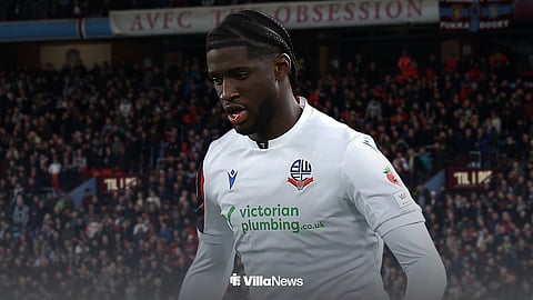 Aston Villa loanee Samuel Iling-Junior in action for Bolton Wanderers with Villa Park background
