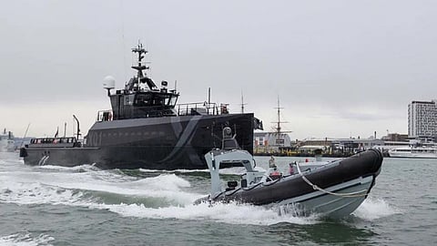 The autonomous RIB during trials accompanied by the experimentation vessel XV Patrick Blackett