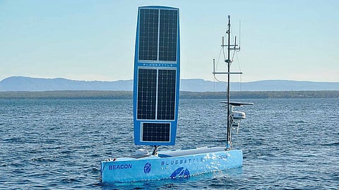 An uncrewed surface vehicle operates in the waters of Jervis Bay during Exercise Autonomous Warrior 22 at HMAS Creswell, ACT.
