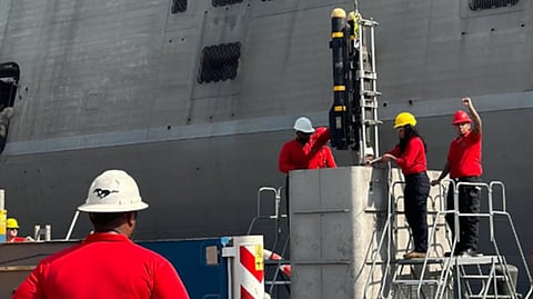 Technicians from the Navy Munitions Command (NMC) Bahrain Detachment deliver hardware and software upgrades aboard USS Indianapolis while the ship is forward deployed to the US. 5th Fleet Area of Responsibility. The upgrades focus on the Surface-to-Surface Missile Module (SSMM), enhancing both its software and hardware systems.