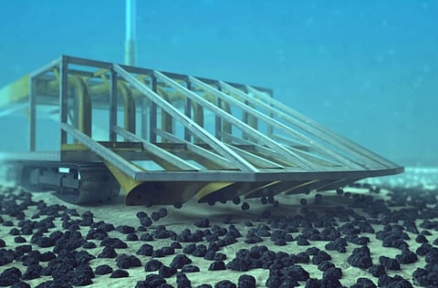 Deep-sea harvesters, specially designed to minimize impact, gather selected metal-rich nodules about 4 km below the surface.