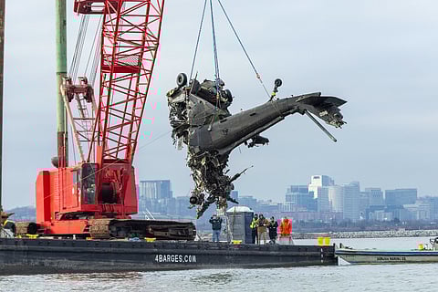 The NTSB recovers the debris of a Sikorsky UH-60 Black Hawk involved in a mid-air collision near DCA in Arlington, VA.