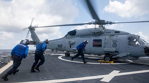 US, Australia, and UK forces conduct joint combined operations in South China Sea