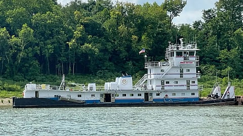 NTSB report reveals pilot was using personal phone just before contact of barge tow with dyke 