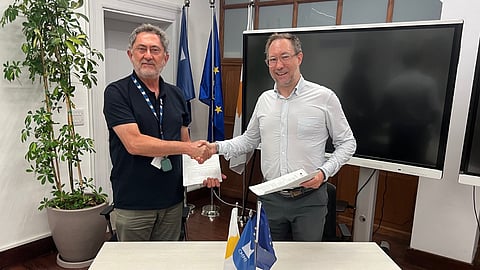 Cyprus Marine and Maritime Institute CEO Zacharias Siokouros (left) and FLANQ Chief Commercial Officer Daniel Esser at the MOU signing, August 5, 2025