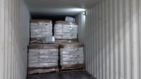 The seized cocaine inside the container