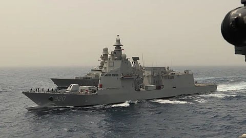 The Indonesian Navy patrol ship KRI Brawijaya (foreground) at the start of her delivery voyage from Italy with the Italian Navy destroyer ITS Caio Duilio providing escort