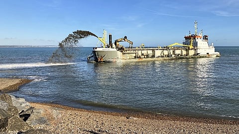 Sospan Dau spraying shingle