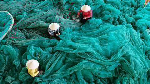 Fishing nets under repair, Vietnam