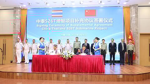 Royal Thai Navy Commander-in-Chief Admiral Jirapol Wongwit and China Shipbuilding and Offshore International Vice President Liu Song sign the amended submarine delivery contract during a ceremony in Beijing, September 16, 2025.