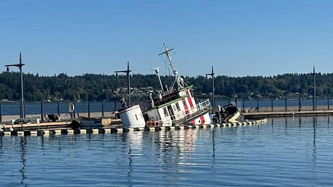 The tug Dominion in a sunken state, Bremerton Marina, Washington.