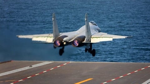 A J-15 fighter aircraft takes off from the deck of the aircraft carrier Fujian somewhere in the South China Sea.