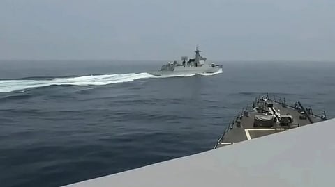 Screen capture of a US Navy video showing a Chinese People's Liberation Army Navy ship cutting across the path of a US Navy destroyer in the Taiwan Strait, June 3, 2023.