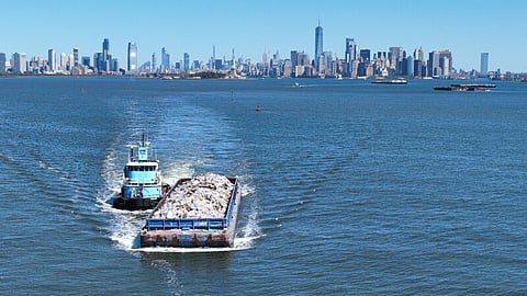 Tug pushing a barge in New York Harbor