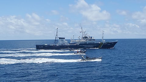 A patrol vessel of the Indonesian Directorate General of Surveillance of Marine and Fisheries Resources and three rigid inflatable boats