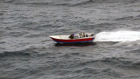 One of the drug-carrying skiffs moving at speed