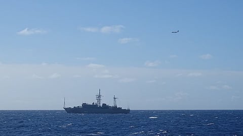 A Coast Guard HC-130 Hercules airplane crew from Air Station Barbers Point monitors a Russian military vessel approximately 15 nautical miles south of Oahu Oct. 29, 2025.