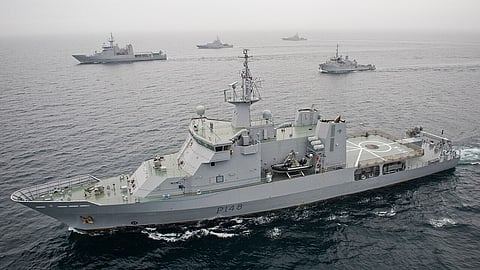 The New Zealand Defense Force conducting fleet maneuvers in the Hauraki Gulf in 2010, including the HMNZS (Protector-class offshore patrol vessels) Otago (foreground), Wellington, Pukaki, Rotoiti, Hawea, Taupo, and Manawanui.