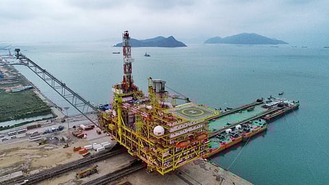 The central platform for CNOOC's Dongfang 13-2 gas fields development project is loaded onto a barge at the COOEC-Fluor fabrication yard, destined for the western South China Sea. 