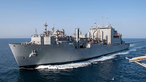 The US Navy Lewis and Clark-class dry cargo ship USNS Cesar Chavez during a replenishment-at-sea with the Wasp-class amphibious assault ship USS Essex in the Gulf of Oman, November 3, 2021