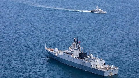 A Russian warship is seen during a joint naval drill between Iran, Russia, and China in the Gulf of Oman, March 15, 2023. 