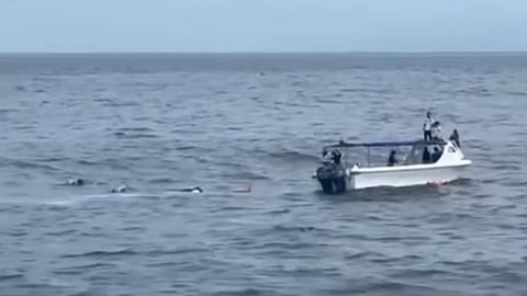 Civilian volunteers aboard a small skiff recover the remains of some of the victims of the sinking of the ferry Trisha Kerstin 3 off Basilan province in the southern Philippines. The incident had a confirmed death toll of 29 as of January 29, 2026.