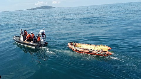 Philippine Coast Guard personnel transport the recovered remains of two people who perished after the ferry Trisha Kerstin 3 sank off Basilan province. The incident had a confirmed death toll of 42 as of February 2, 2026.