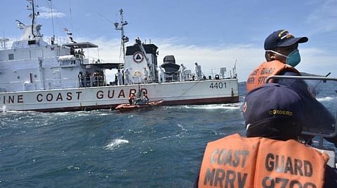 The Philippine Coast Guard multi-role response vessel BRP Tubbataha and other small boats assist in the search for the missing victims of the sinking of the ferry Trisha Kerstin 3 in the waters off Basilan province. As of February 4, 2026, when this photograph was taken, the incident had a confirmed death toll of 45.