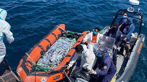 Philippine Coast Guard personnel bring a recovered cadaver on board the multi-role response vessel BRP Melchora Aquino off Basilan province, February 9, 2026. The deceased individual has been identified as one of at least 51 people who perished after the Ro-Pax ferry Trisha Kerstin 3 sank in those same waters less than a month earlier.