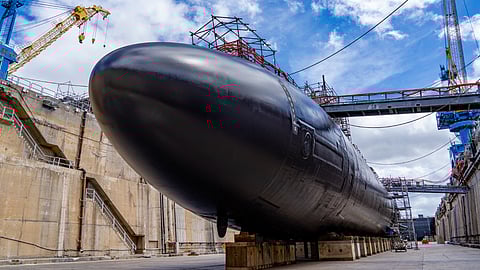 The US Navy Los Angeles-class fast attack submarine USS Topeka being undocked at Pearl Harbor Naval Shipyard and Intermediate Maintenance Facility, July 27, 2021