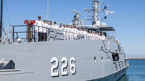 Crew stand on the forward deck of ADV Cape Hawke, the final Evolved Cape-class patrol boat to be built for the Royal Australian Navy.