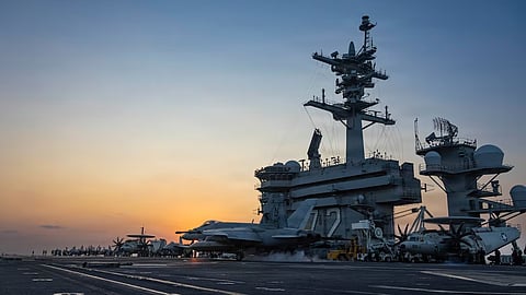 An F/A-18E Super Hornet, attached to Strike Fighter Squadron (VFA) 14, makes an arrested landing on the flight deck of Nimitz-class aircraft carrier USS Abraham Lincoln (CVN 72) in support of Operation Epic Fury, March 4, 2026