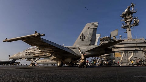 An F/A-18F Super Hornet attached to the "Black Aces" of Strike Fighter Squadron 41 prepares to launch from the flight deck of the Nimitz-class aircraft carrier USS Abraham Lincoln in support of Operation Epic Fury, March 4, 2026.