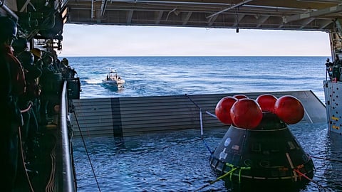 US Navy sailors assigned to the amphibious transport dock USS John P. Murtha and NASA engineers prepare to release a crew module test article from the ship’s well deck, January 26, 2026. John P. Murtha is underway in the US Third Fleet area of operations performing just-in-time training in support of US Space Command's human space flight recovery mission to retrieve NASA’s Artemis II crew and spacecraft following their splashdown in the Pacific Ocean.