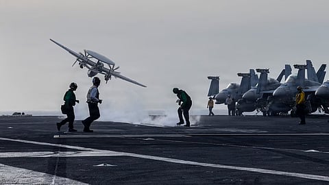 An E-2D Hawkeye, attached to Airborne Command and Control Squadron (VAW) 117, launches from the flight deck of Nimitz-class aircraft carrier USS Abraham Lincoln (CVN 72) during Operation Epic Fury, March 31, 2026