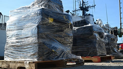 Bales of illegal narcotics are placed on pallets by crewmembers aboard the US Coast Guard medium endurance cutter USCGC Escanaba during a drug offload of 7,050 pounds of cocaine at Port Everglades, Florida, April 27, 2026. The seized contraband was the result of one interdiction in the Caribbean Sea and one interdiction in the Eastern Pacific Ocean worth an estimated US$53 million.