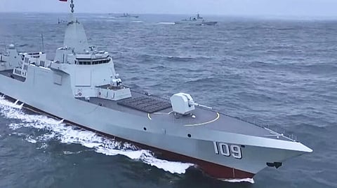 The People's Liberation Army Navy Type 055D destroyers Dongguan (nearest to camera) and Anqing. Both ships entered service in March 2026.