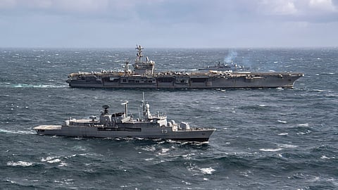 The Argentine Navy Almirante Brown-class destroyers ARA Sarandi (nearest to camera) and ARA La Argentina steam alongside the US Navy aircraft carrier USS Nimitz during a bilateral maritime engagement in the Atlantic Ocean, April 29, 2026.