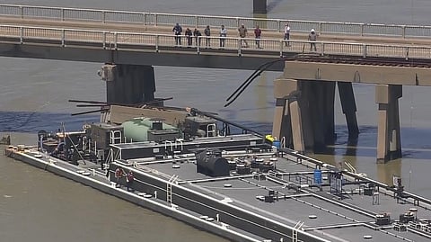 The barge MMLP 321 after contact with the Pelican Island Bridge.