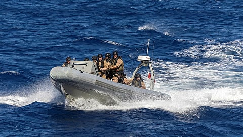 Royal Canadian Navy sailors from HMCS Charlottetown prepare to board HMAS Toowoomba during the boarding exercise held in the South China Sea.