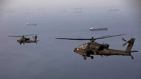 US Apache gunships over the Strait of Hormuz