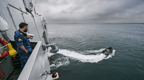 A small boat departs from the Belgian Navy mine countermeasures mothership Oostende during tests off the coast of Brittany, France.