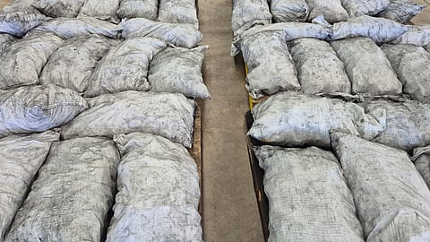 Seized charcoal bags containing the imported methamphetamine