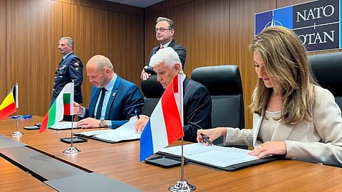 Belgian Defence Minister Theo Francken, Bulgarian Defence Minister Dimitar Soyanov, and Dutch Deputy Prime Minister and Defence Minister Dilan Yeşilgöz-Zegerius sign the Tripartite-class ship MOU at a NATO Summit in Ankara, July 8, 2026.