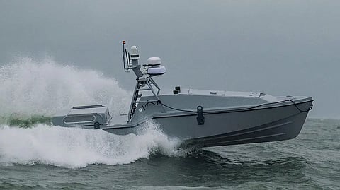 A Saronic Technologies 24-foot unmanned surface vehicle. Saronic said three examples of the USV were used in a successful attack by US forces against an Iranian submarine and the naval base at Bandar Abbas on July 12, 2026.