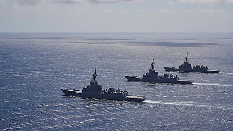The Royal Australian Navy's three Hobart-class air warfare destroyers conduct officer of the watch manoeuvres in the Eastern Australian Exercise Area off the south coast of New South Wales, December 10, 2020.