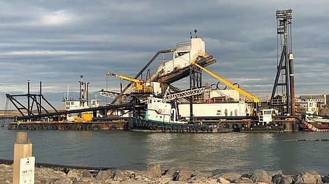 Oyster Bay dredging sand from Lake Montauk Harbor