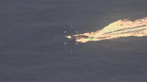 A boat carrying suspected illegal aliens just prior to being intercepted and boarded by US Coast Guard and US Customs and Border Protection personnel near San Clemente Island, California, July 29, 2026. A 56-year-old male who was among the suspected aliens was found unresponsive and was later pronounced deceased.