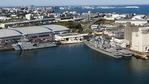 The Paul Watson Foundation motor yacht Bandero in Reykjavik positioned between an Icelandic Coast Guard vessel and what appear to be two warships