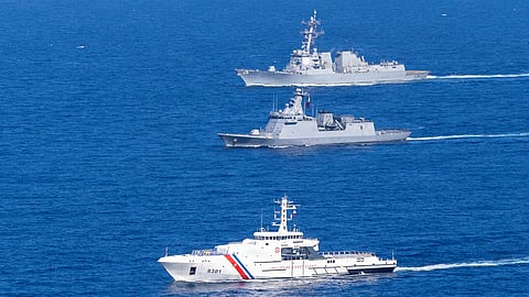 From front to back, the Philippine Coast Guard Gabriela Silang-class offshore patrol vessel BRP Gabriela Silang, the Philippine Navy Jose Rizal-class guided-missile frigate BRP Antonio Luna, and the US Navy Arleigh Burke-class guided-missile destroyer USS Dewey steam in formation in the Philippine Sea, during the multilateral Maritime Cooperative Activity alongside Japan and the Philippines in the Philippines’ exclusive economic zone, February 25, 2026.